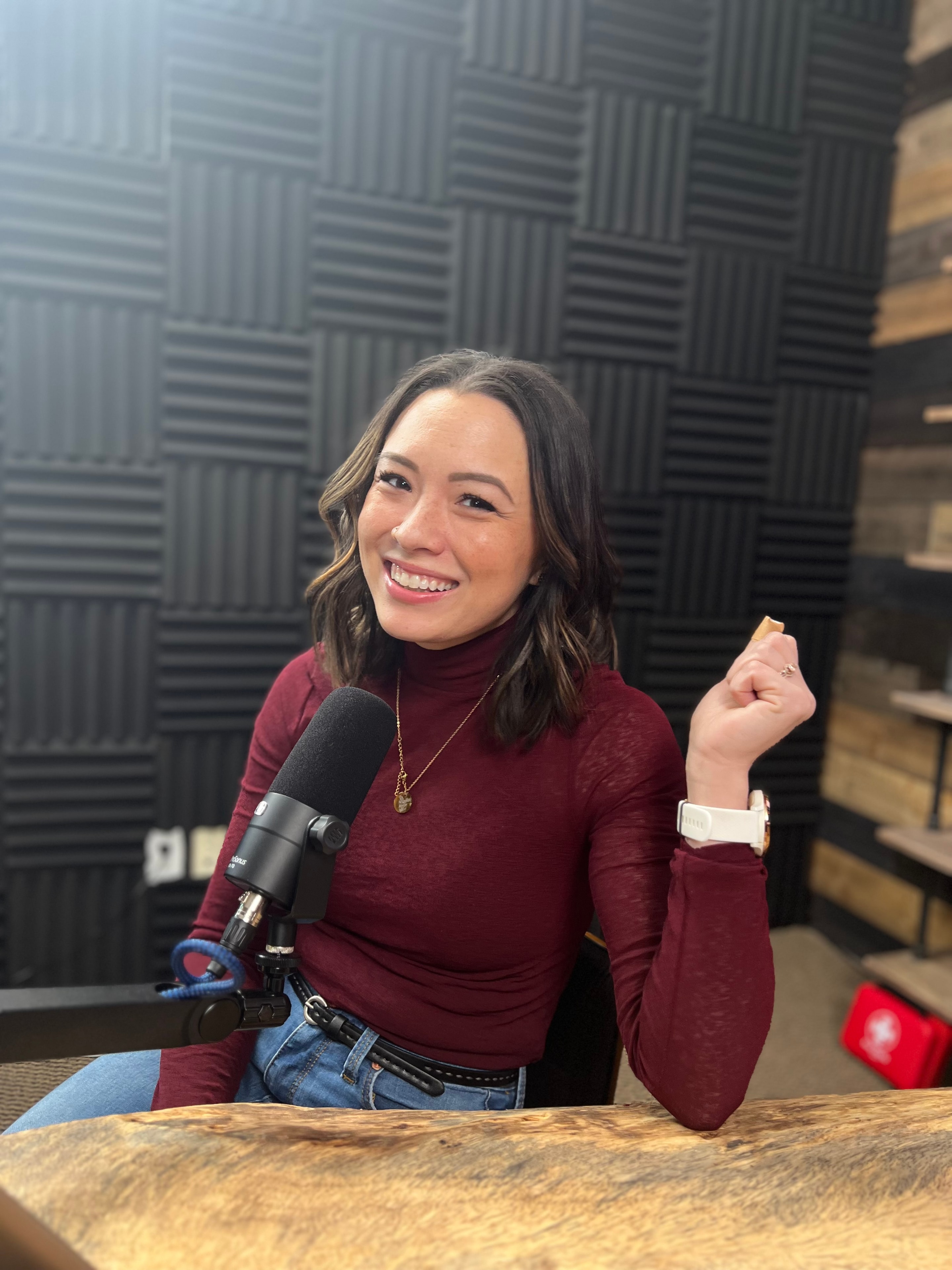 Keilani at the podcast microphone